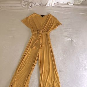 Cute capri length flair romper.